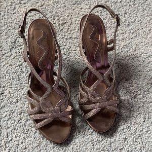 Worn twice sparkly silver heels!